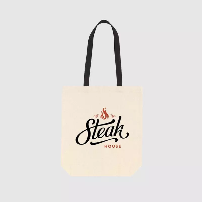 Custom mid weight tote made from tightly woven canvas, with shoulder-carry long handles