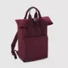Polyester rolltop backpack with padded adjustable shoulder straps with padded back panel and large front zip pocket and organiser section, capacity 14 litres