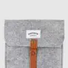 woven brand label on felt folder