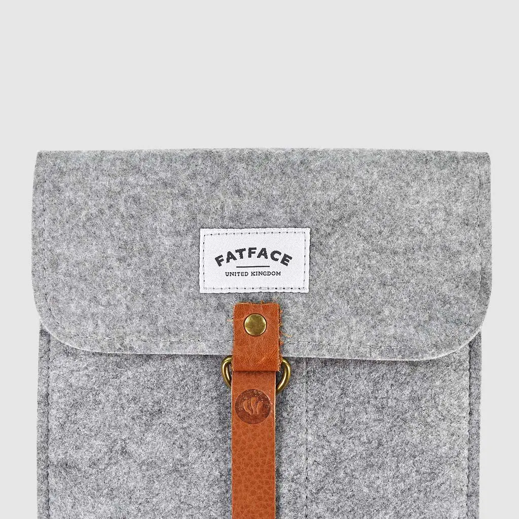 woven brand label on felt folder