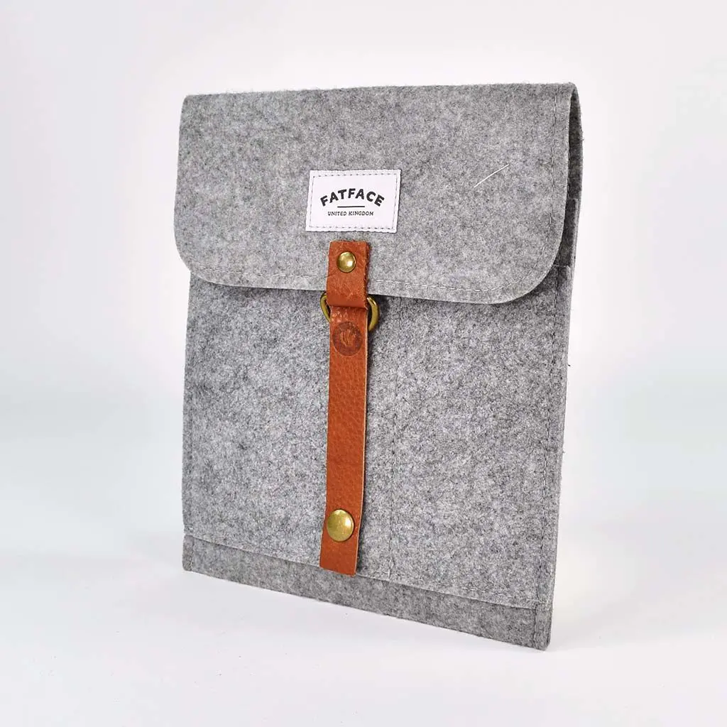 grey felt ipad case with brown leather strap detail