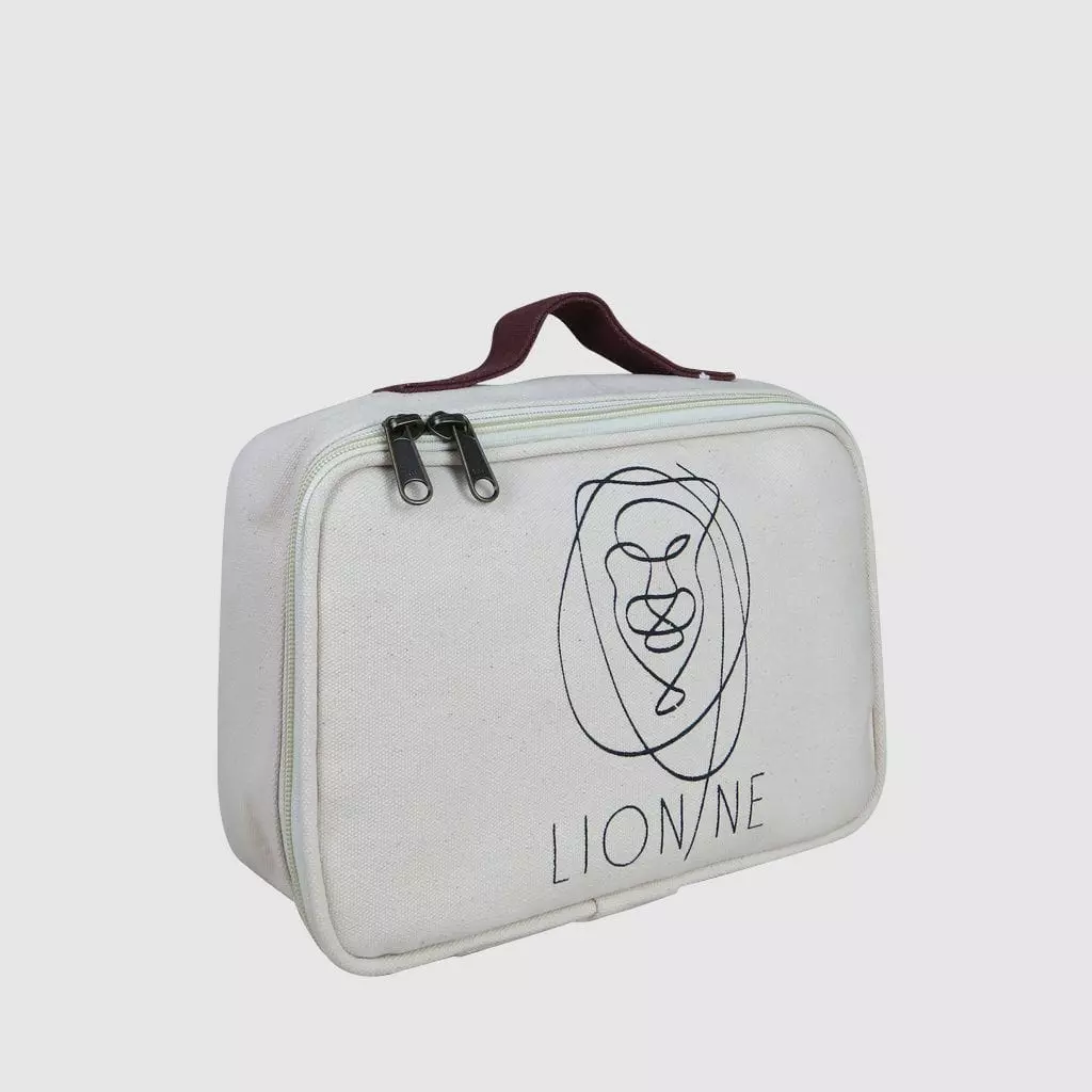Custom made cosmetic case in natural with leather handle and metal zip