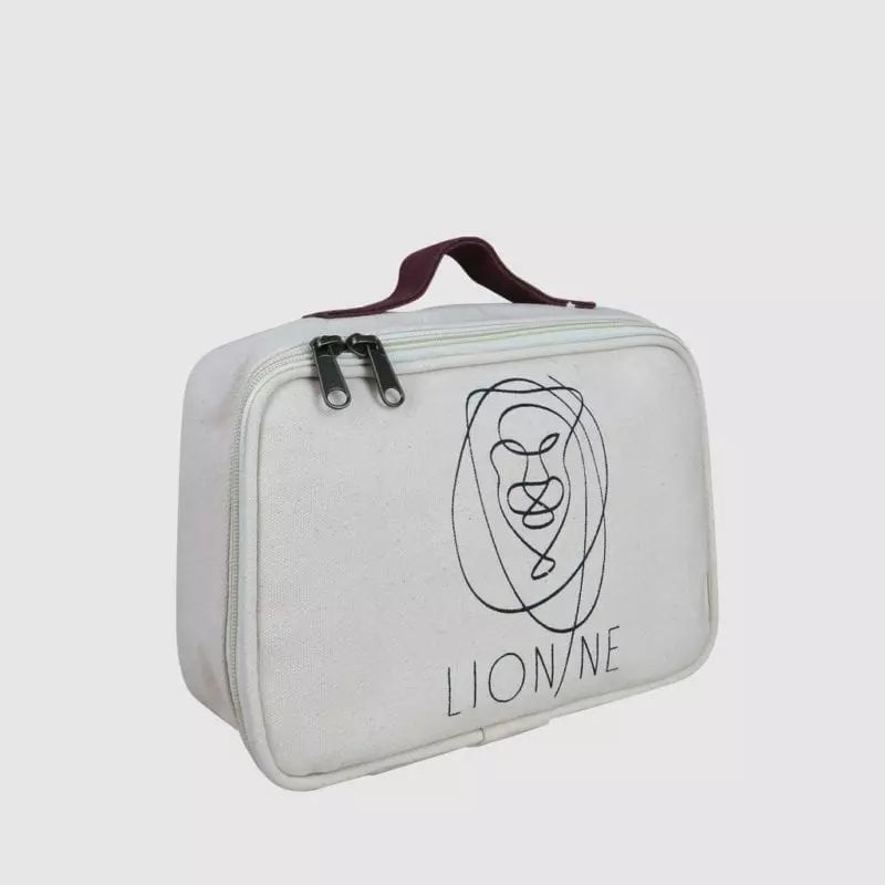 Custom made cosmetic case in natural with leather handle and metal zip