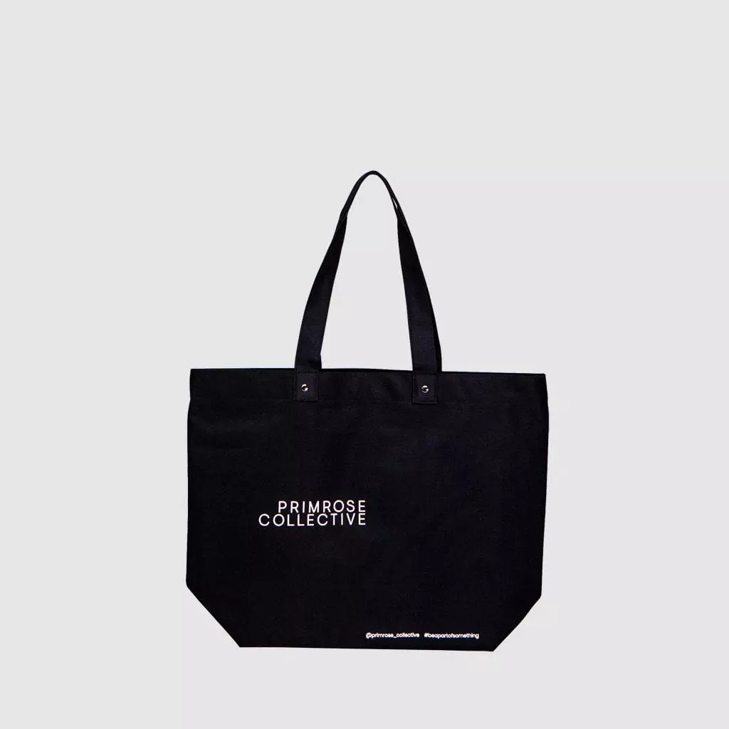 Shoulder bag customised with print and metal rivets