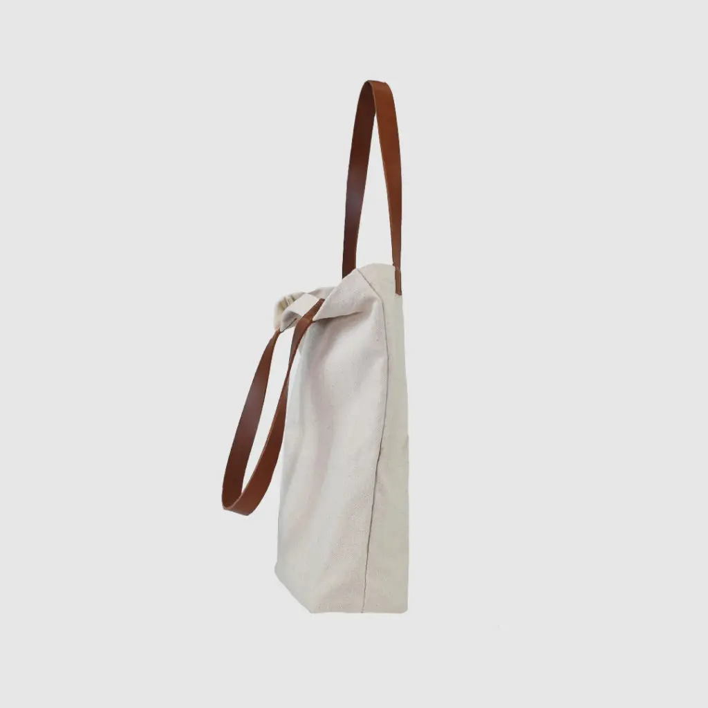 natural canvas tote bag with tan colour PU leather handles