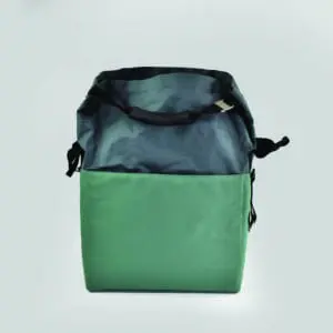 side view of cool bag with black handle and silver metal accessory closure