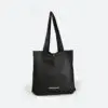 black tyvek tote bag with long handles and silver metal popper closure. White logo print.