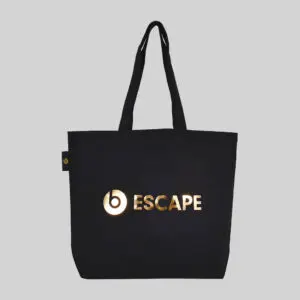Gold mirror print on Beats by Dre on black oversize tote with woven label on outside seam also with gold logo this is how to work with a British vendor
