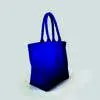 blue luxury landscape tote bag shown from side view