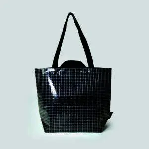 Custom bag design with short and long shoulder straps, clear panels of bag with navy felt show through