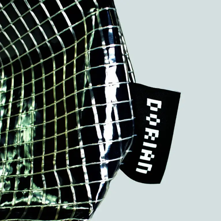 woven logo label on side panel of clear bag