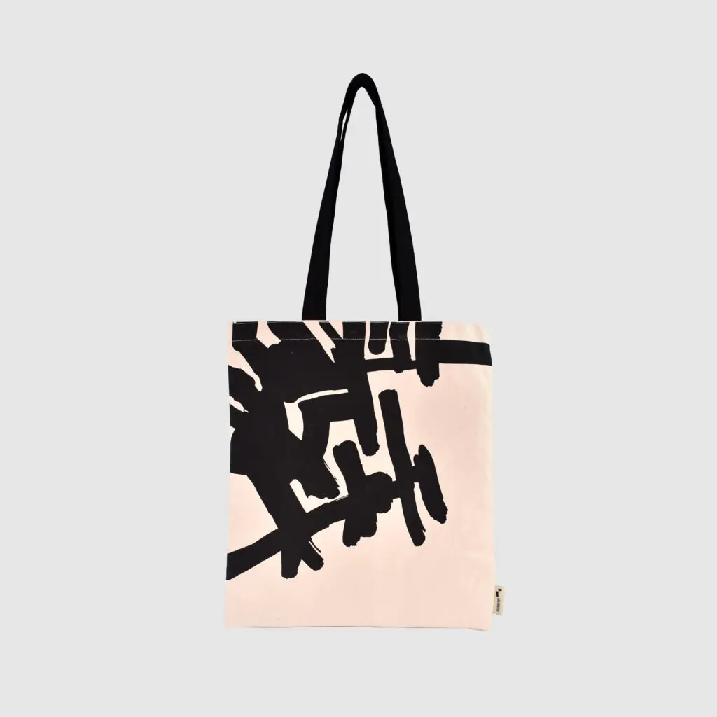 Hauser and Wirth canvas tote bag with black handles and edge to edge print