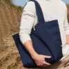 Man Outside Wearing French Navy 10oz Organic Cotton Toggle Landscape Canvas Shopper