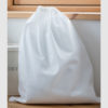 Custom laundry drawstring bag, with draw cords available and a soft fabric