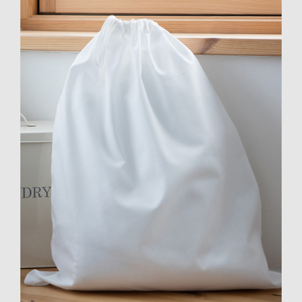 Custom laundry drawstring bag, with draw cords available and a soft fabric