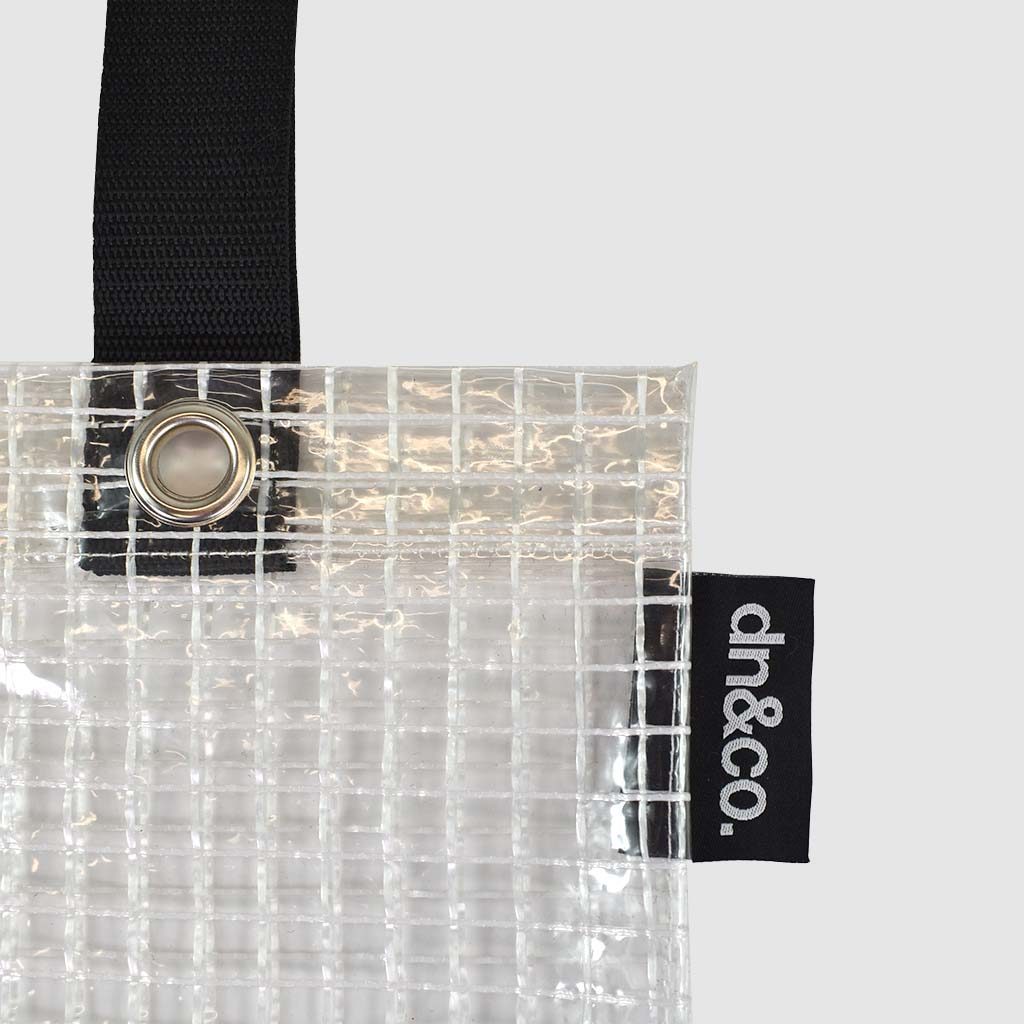 transparent bag with print and woven black logo label