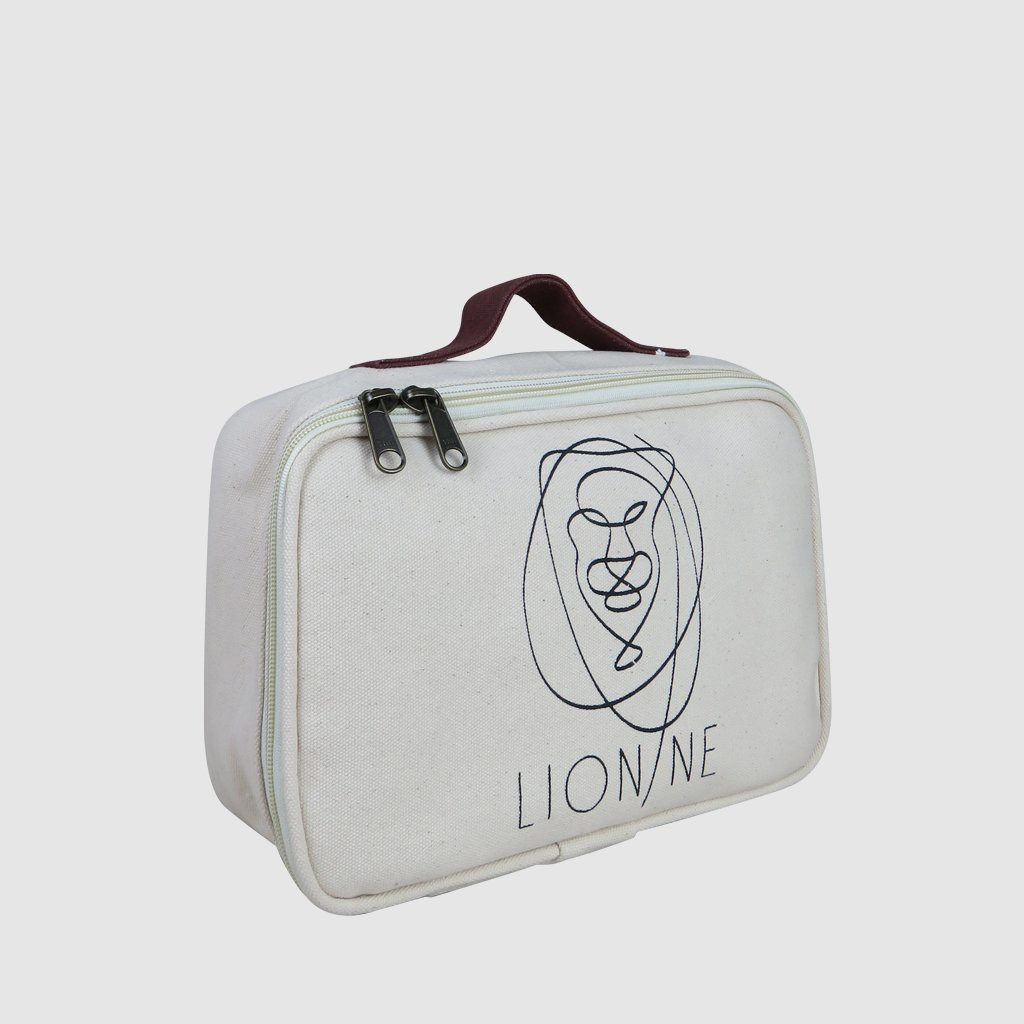 Custom made cosmetic case in natural with leather handle and metal zip