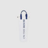 custom bottle bag in white canvas with PU blue handles and logo print