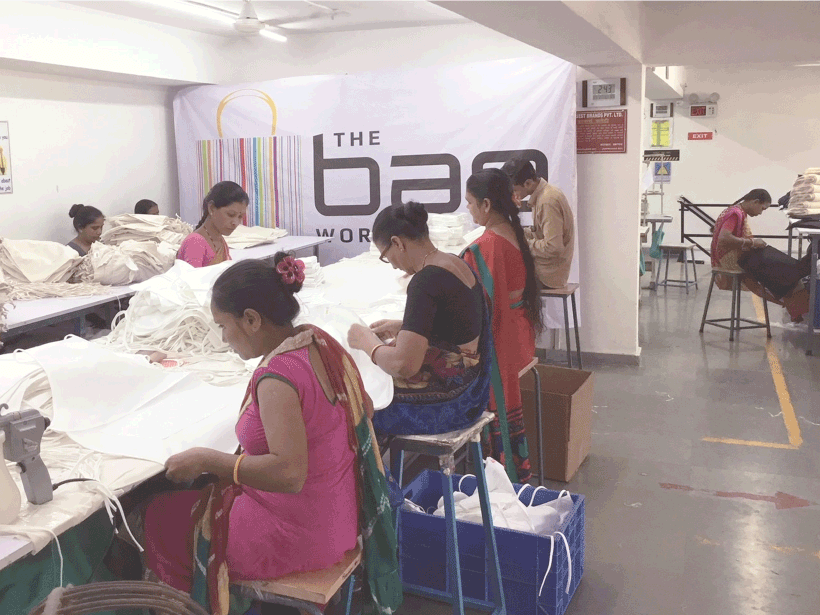 custom bag manufacturing with colleagues at work
