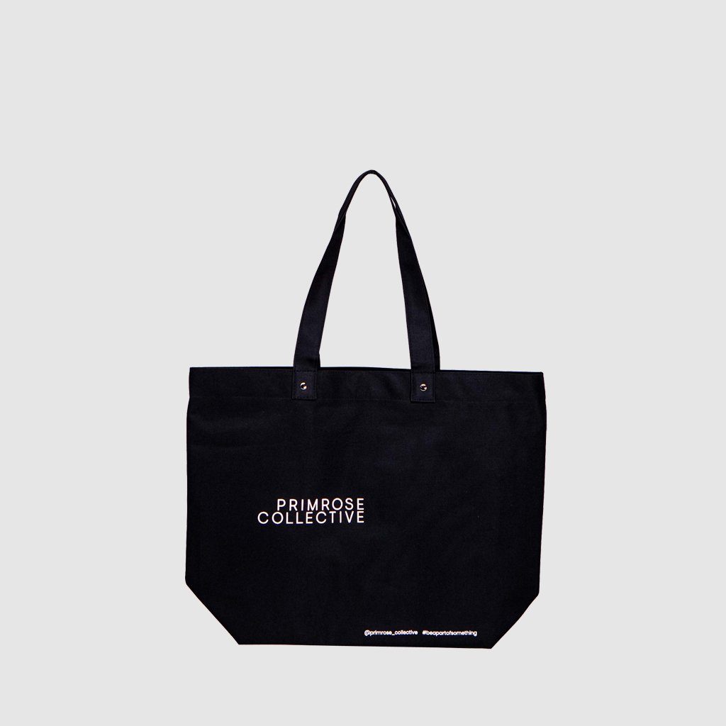 Shoulder bag customised with print and metal rivets
