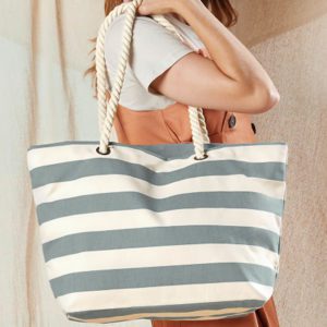Women Holding Blue/White Striped Beach Bag with Woven Rope Handles