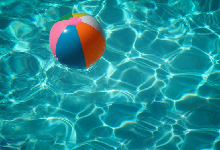 Multicolour Beach Ball Floating on Water