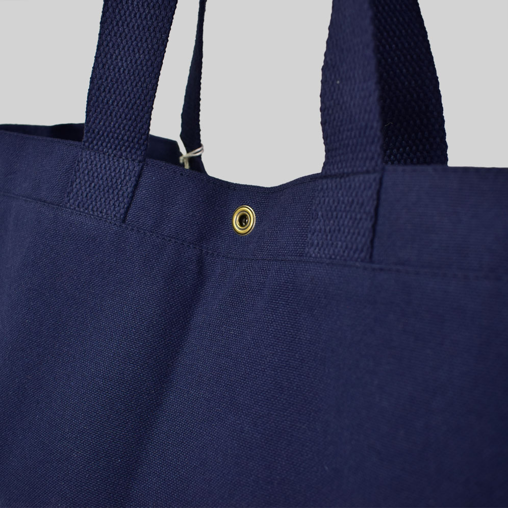 navy blue bag with metal popper clasp