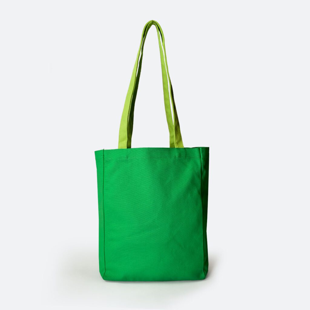 front facing view of green A4 bright green Pantone matched bag with lime green handles standing upwards