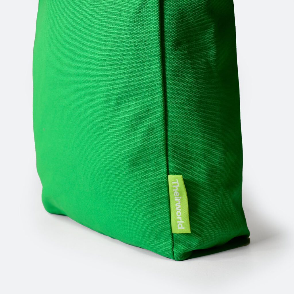 lime green logo label on bright green A4 bag