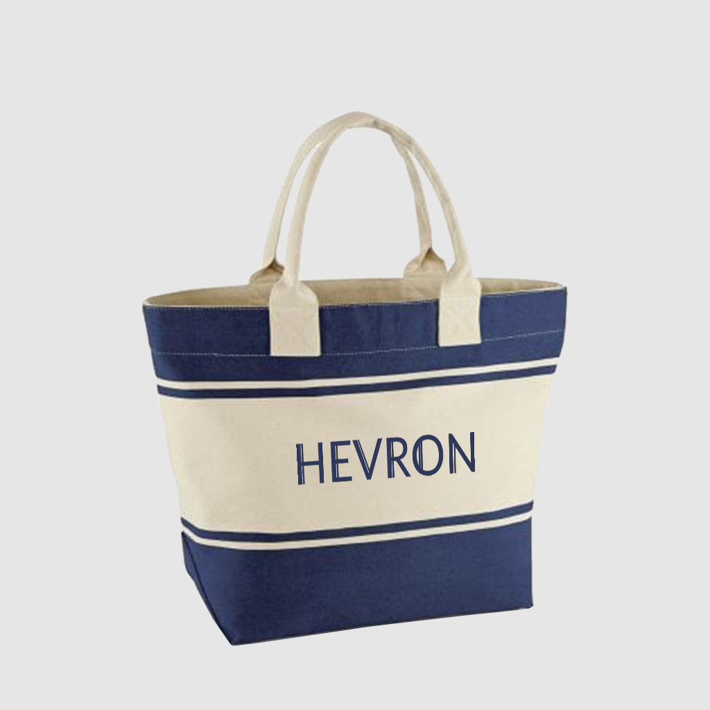 blue and white striped canvas beach bag with short handles