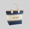 blue and natural coloured beach bag with short natural carry handles