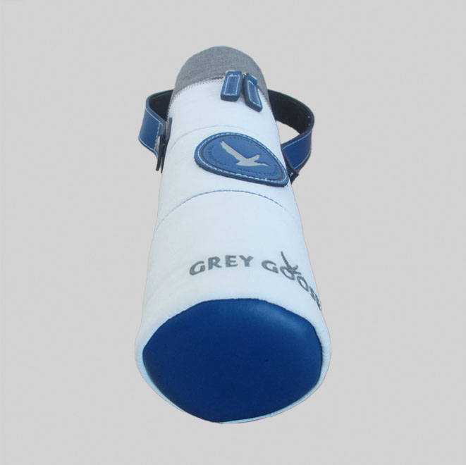 BLUE PU LEATHER BASE OF BOTTLE BAG THAT IS WHITE WITH GREY GOOSE EMBROIDERY
