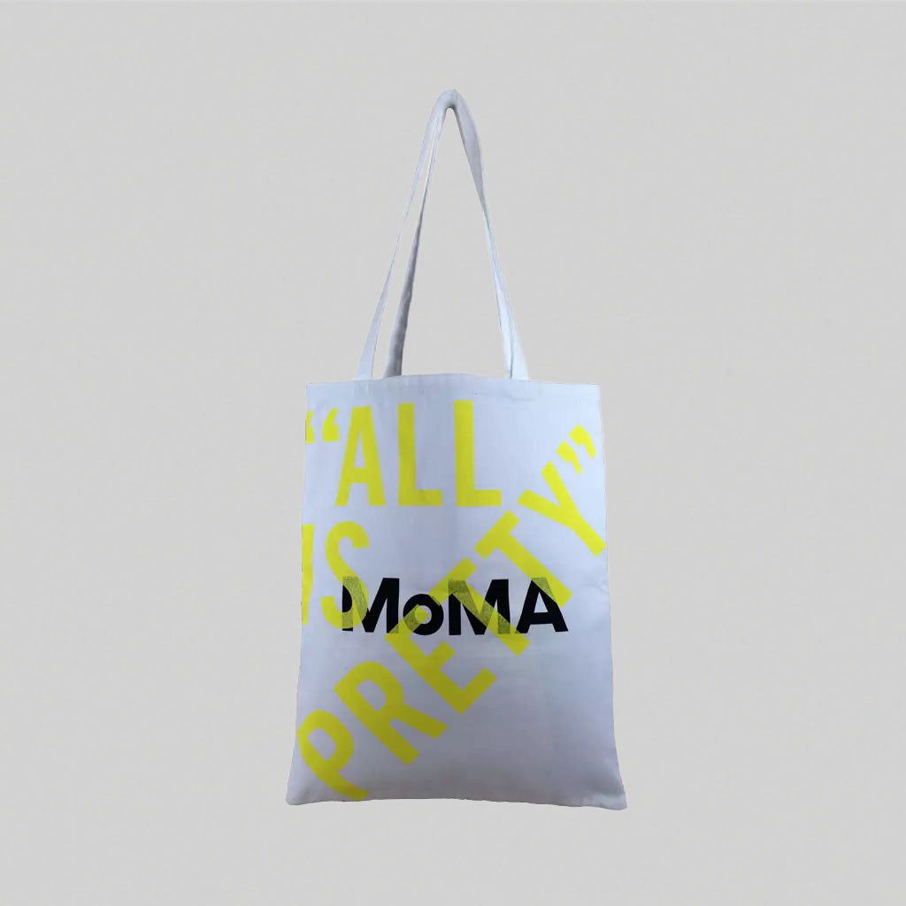 white tote bag with MOMA creative print