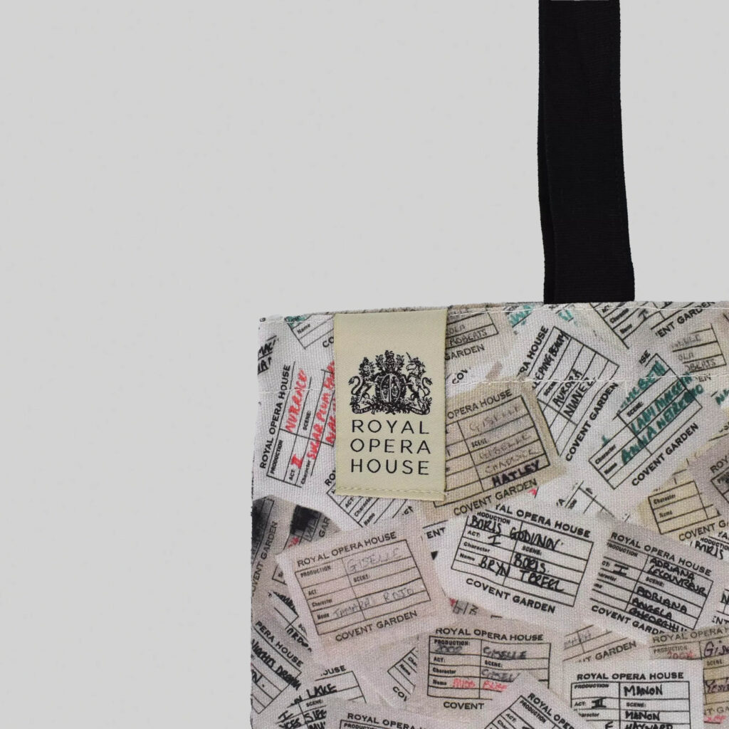 Royal Opera House logo label on top seam of tote bag with digital print