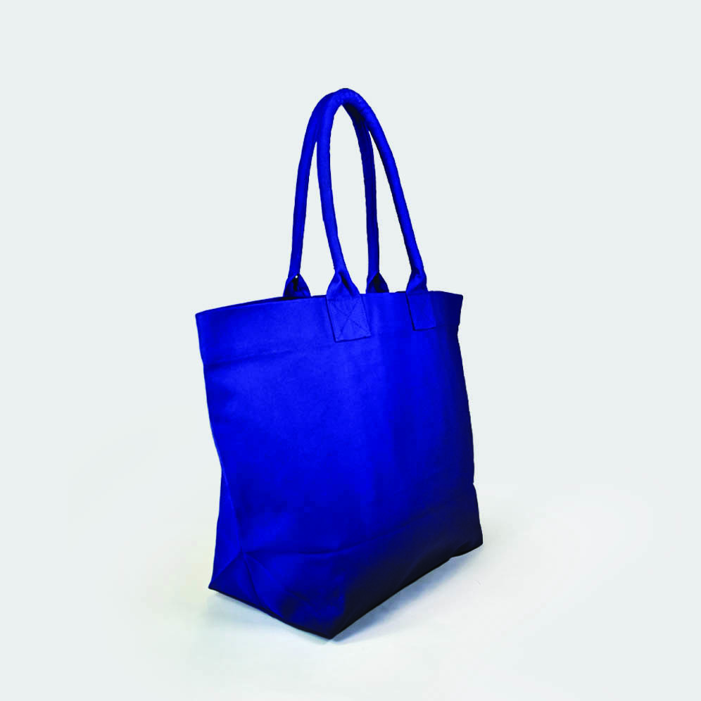blue luxury landscape tote bag shown from side view