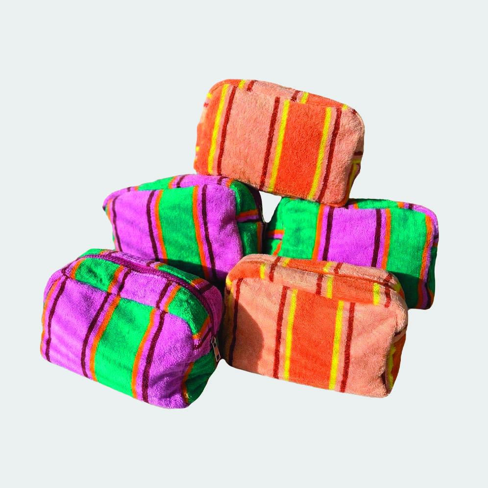 collection of terry cloth wash bags in different colours